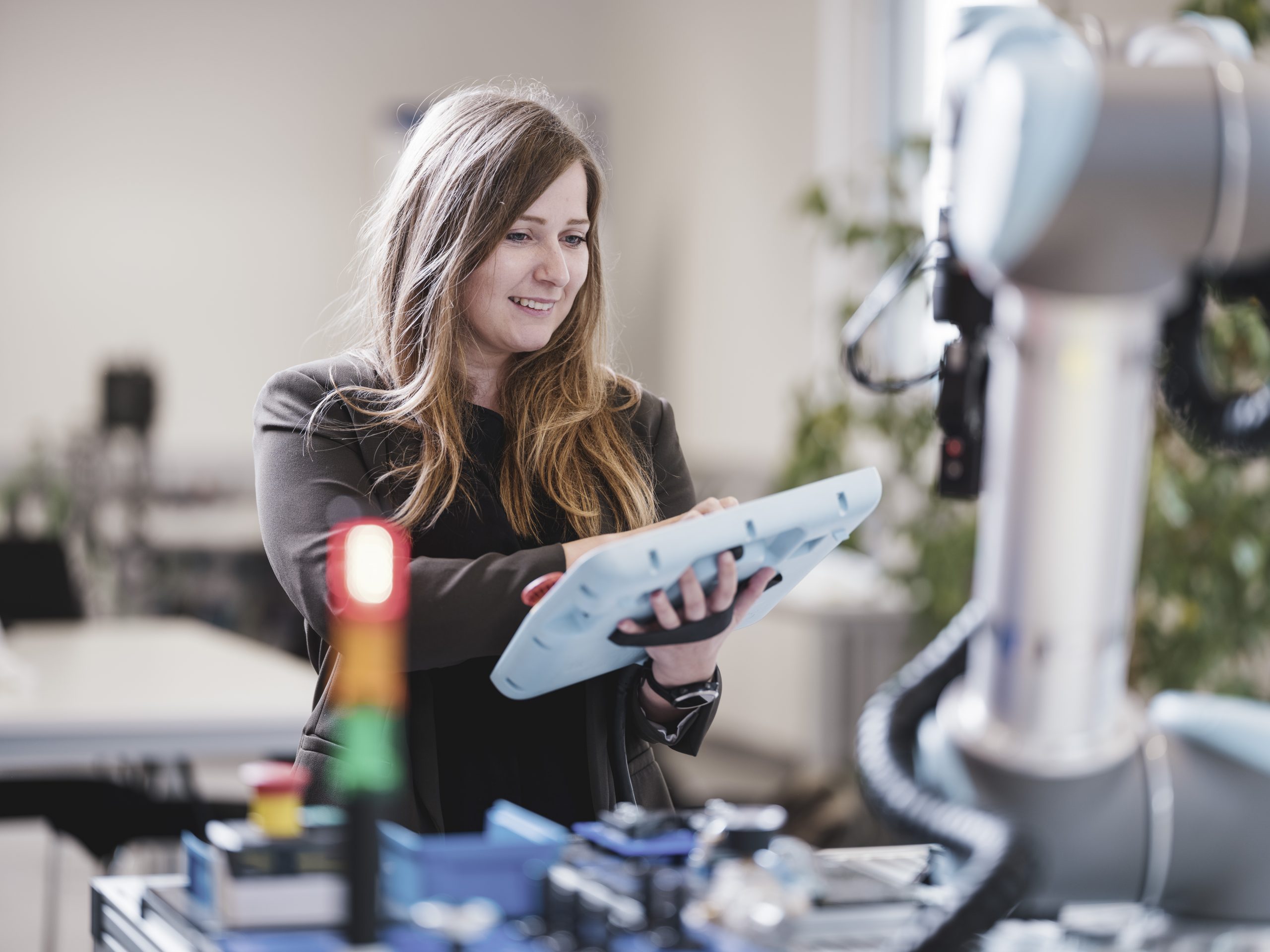 Woman working in the robotics la